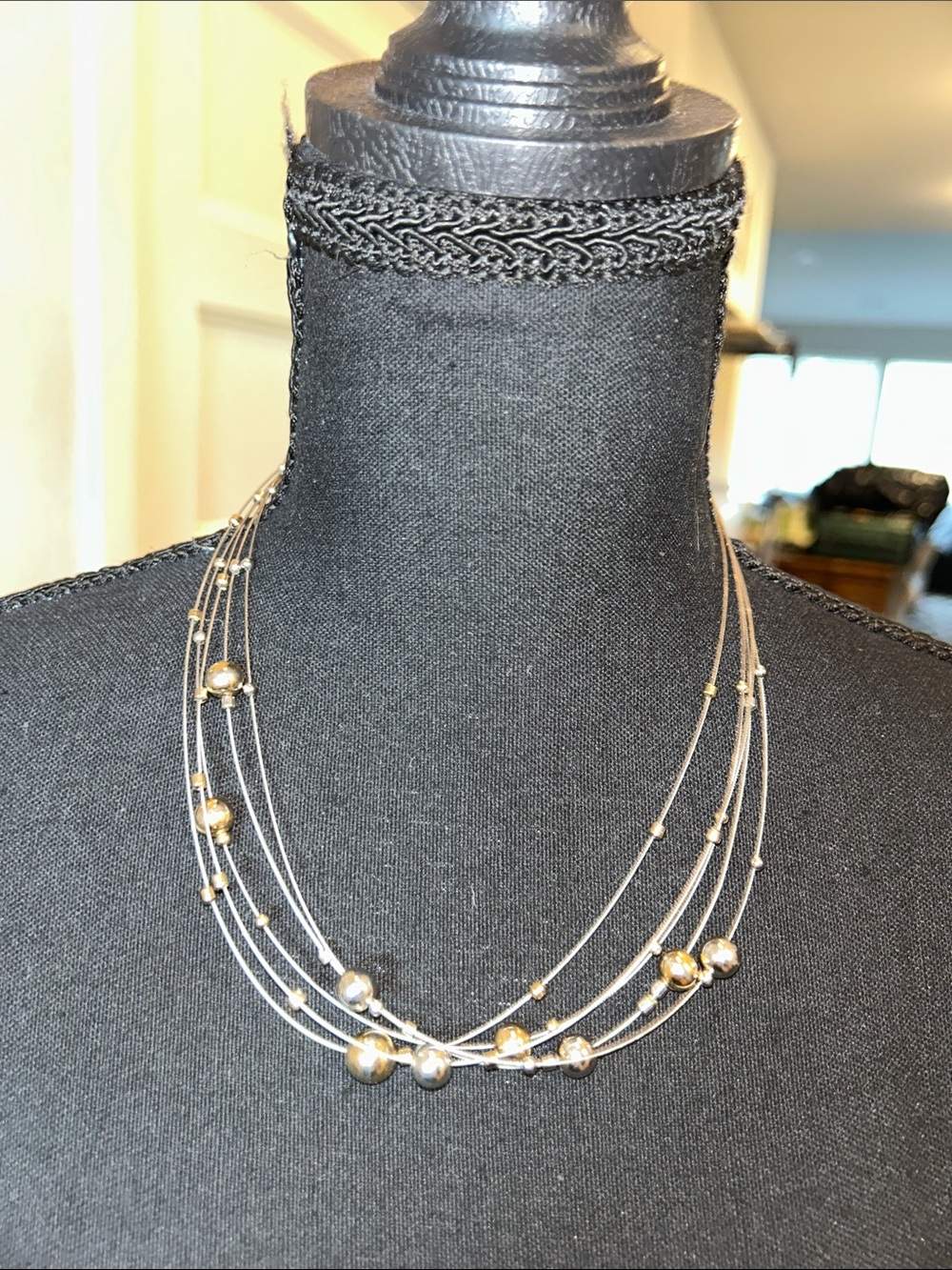 Multi-Strand Silver Necklace with Gold Accent Beads